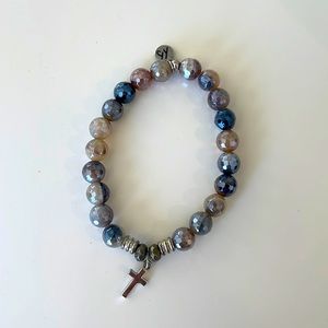 Tiffany Jazelle Sterling cross on storm agate
